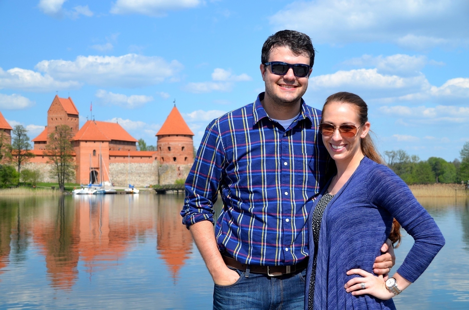 Matt and Kalena in front of a castle in Lithuania